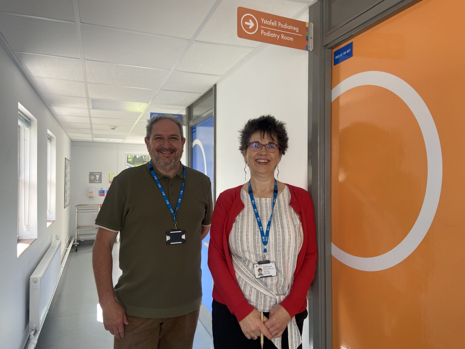 Image of Powys Health Charity and Dementia Staff Member in corridor of Community Hospital